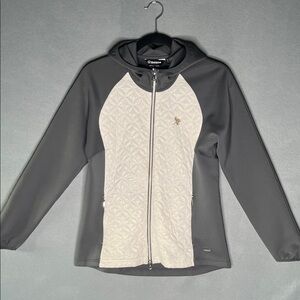 Women’s golf jacket by Sunice. Sz med